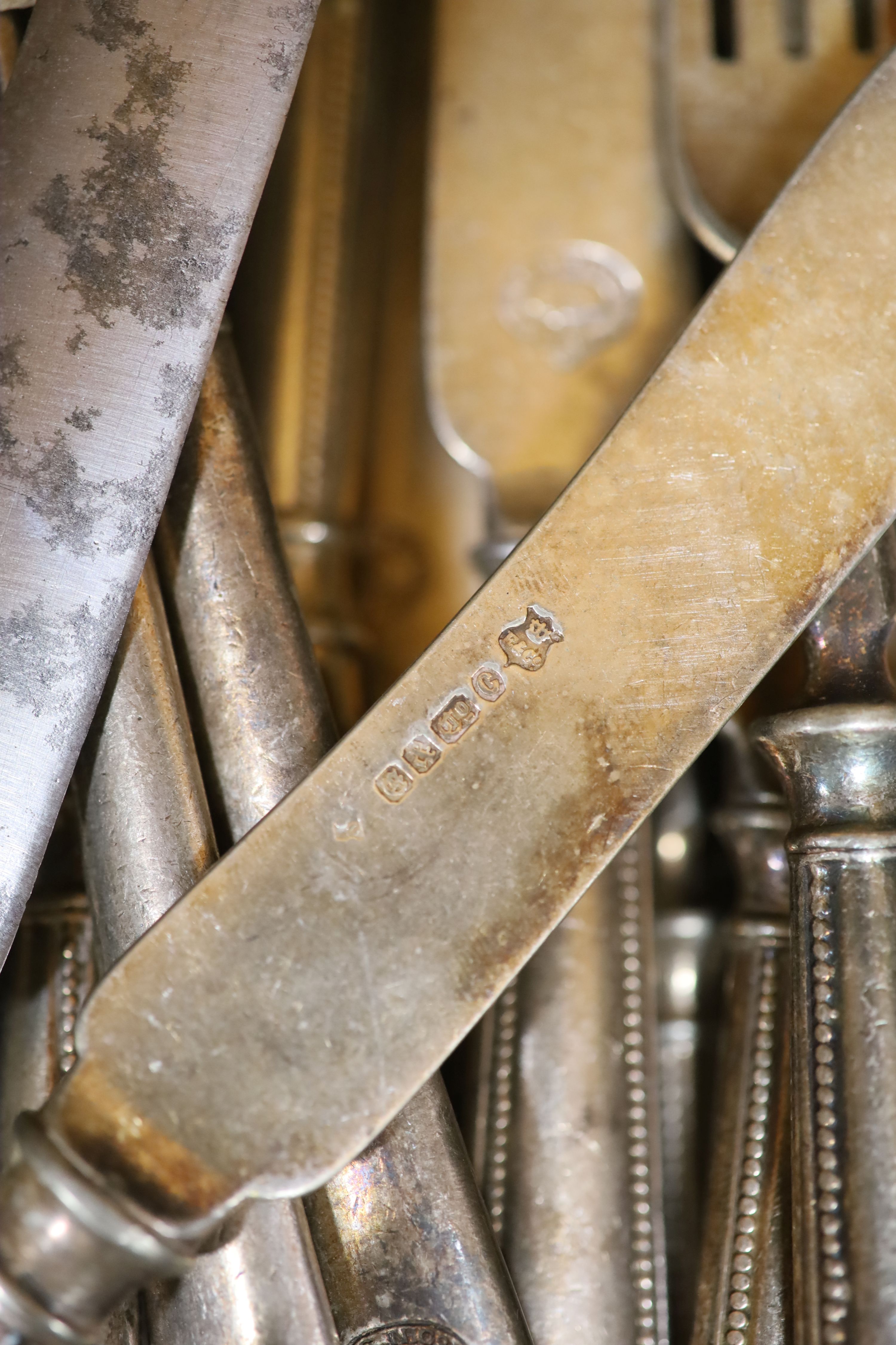 A quantity of silver and plated ware including cutlery